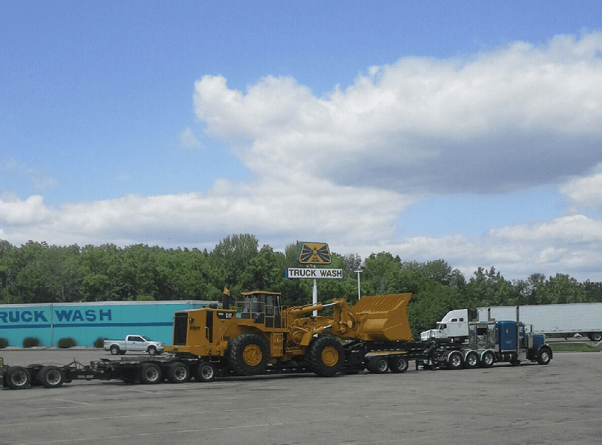 Parked Truck Hauling a Tractor